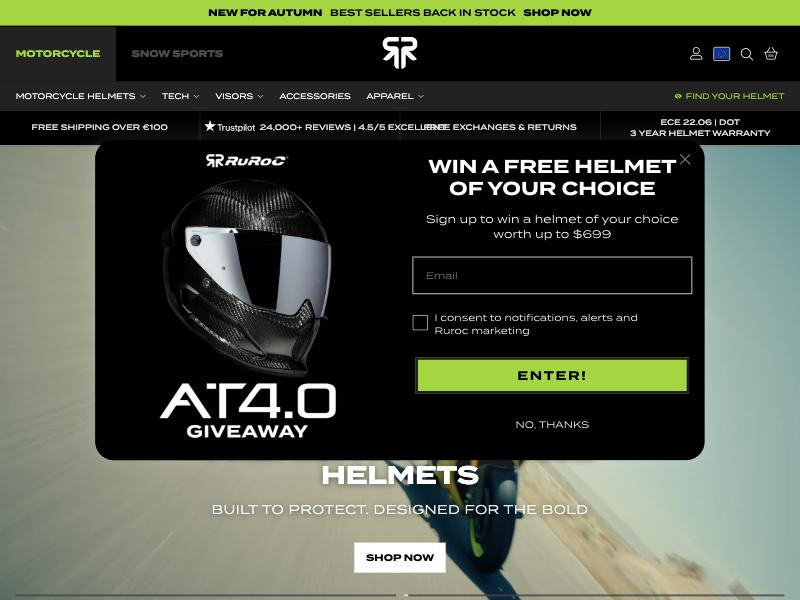 Ruroc popup reading "WIN A FREE HELMET OF YOUR CHOICE" with an email field and an ENTER! button, for the AT4.0 Giveaway worth up to $699